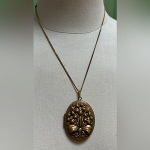 Vintage locket on chain.